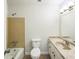 Hall bath with a shower-tub combo, single sink vanity, and tile flooring at 1526 Tanglewood Nw Way, Conyers, GA 30012