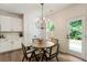 Charming dining area with stylish chairs and natural light flowing in at 160 Winner St, Acworth, GA 30102