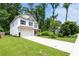 Attractive home with a lush green lawn, long driveway, and an attached two-car garage at 160 Winner St, Acworth, GA 30102