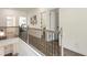 Upstairs hallway features hardwood floors, decorative railing, and plenty of natural light at 160 Winner St, Acworth, GA 30102