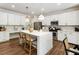 Modern kitchen with a spacious island and stainless steel appliances at 160 Winner St, Acworth, GA 30102
