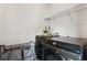 Modern laundry room featuring front load washer and dryer and wire shelving for ample storage at 160 Winner St, Acworth, GA 30102