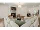 Comfortable living room featuring a cozy fireplace and a large sectional sofa at 160 Winner St, Acworth, GA 30102