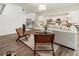 Cozy living room with an open floor plan, seamlessly connected to the staircase and kitchen at 160 Winner St, Acworth, GA 30102
