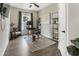 Functional office with a stand-up desk, wall shelving, and natural light at 160 Winner St, Acworth, GA 30102