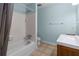 Bathroom featuring shower and tub combination, tile floors, and a vanity at 1701 Wiscasset Pl, Tucker, GA 30084