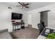 Bedroom featuring a desk, sofa, and electronic equipment, ideal for a creative space at 1701 Wiscasset Pl, Tucker, GA 30084