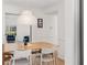 Dining room with natural light, modern lighting and seating at 1701 Wiscasset Pl, Tucker, GA 30084