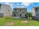 Expansive backyard with lush green grass, patio, and a well-maintained lawn at 5123 Jack Dr, Decatur, GA 30035
