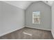 Cozy bedroom with plush carpeting and a window view at 5123 Jack Dr, Decatur, GA 30035