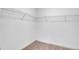 Walk-in closet with wire shelving and neutral carpet at 5123 Jack Dr, Decatur, GA 30035