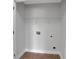 Laundry room with tile floors and washer/dryer hookups at 5123 Jack Dr, Decatur, GA 30035