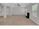 Expansive living area featuring neutral paint, a fireplace, and plenty of natural light at 5123 Jack Dr, Decatur, GA 30035