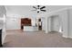 Open-concept living space leading to a kitchen with stainless steel appliances at 5123 Jack Dr, Decatur, GA 30035
