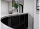 Close up of finished basement bar with concrete countertop and place for storage at 1582 Pine Cir, Austell, GA 30168