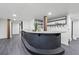 Finished basement bar area featuring sleek countertops, dark cabinetry, and stylish decor at 1582 Pine Cir, Austell, GA 30168