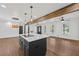 Contemporary kitchen island with sleek countertops, pendant lighting, and an open layout to the living spaces at 1582 Pine Cir, Austell, GA 30168