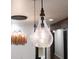 Close up of pendant lighting features modern design with clear glass at 1582 Pine Cir, Austell, GA 30168