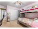 Comfortable bedroom featuring bunk beds, closet and carpeted floor at 1593 Poplarwood Lane Northwest Ln, Lawrenceville, GA 30043