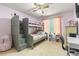 Cozy bedroom with bunk beds, ceiling fan and warm, natural light at 1593 Poplarwood Lane Northwest Ln, Lawrenceville, GA 30043