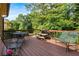 Relaxing outdoor deck with wooded views and outdoor seating, perfect for entertaining or enjoying nature at 1593 Poplarwood Lane Northwest Ln, Lawrenceville, GA 30043