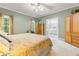 Spacious main bedroom with a ceiling fan, ensuite bathroom, and walk-in closet at 1593 Poplarwood Lane Northwest Ln, Lawrenceville, GA 30043