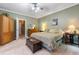 Relaxing main bedroom featuring carpet, neutral walls, and ample closet space at 1593 Poplarwood Lane Northwest Ln, Lawrenceville, GA 30043