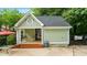 Community pool house featuring seating areas and a clean green exterior at 1593 Poplarwood Lane Northwest Ln, Lawrenceville, GA 30043