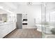 Bright bathroom with a double vanity, walk-in glass shower, and standalone tub at 1596 Fearn Ne Cir, Brookhaven, GA 30319