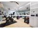 Home gym includes a Peloton, multiple weights, and built-in shelves, perfect for fitness enthusiasts at 1596 Fearn Ne Cir, Brookhaven, GA 30319