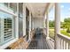 Inviting front porch with rocking chairs, stone accents and classic columns at 1596 Fearn Ne Cir, Brookhaven, GA 30319