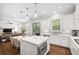 Modern kitchen with stainless steel appliances, a center island, and an open layout at 1596 Fearn Ne Cir, Brookhaven, GA 30319