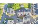 Aerial view of townhome featuring a well-maintained landscape and convenient parking at 2587 Ocean Walk Nw Dr, Atlanta, GA 30318