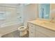 Bathroom features quartz countertops, tub shower combo, and modern fixtures at 2587 Ocean Walk Nw Dr, Atlanta, GA 30318