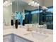 Bathroom featuring double sinks, granite countertops, and large mirror at 2587 Ocean Walk Nw Dr, Atlanta, GA 30318