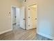 Spacious bedroom featuring an open door and neutral tones throughout at 2587 Ocean Walk Nw Dr, Atlanta, GA 30318