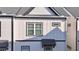 New construction with modern exterior, vertical siding, and black trim windows at 2587 Ocean Walk Nw Dr, Atlanta, GA 30318