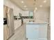 Spacious kitchen with a large island, granite countertops and stainless steel appliances at 2587 Ocean Walk Nw Dr, Atlanta, GA 30318