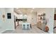 Modern kitchen with stainless steel appliances, an island with bar stools, and sleek countertops offers a stylish cooking space at 2587 Ocean Walk Nw Dr, Atlanta, GA 30318