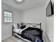 Cozy bedroom with daybed, gray walls, and natural light at 3799 Sweetbriar Cir, Lithia Springs, GA 30122