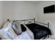 Bedroom featuring a black wardrobe, dresser, wall mounted TV, and comfortable bed at 3799 Sweetbriar Cir, Lithia Springs, GA 30122