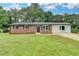 Charming brick home with well-manicured lawn and updated landscaping at 3799 Sweetbriar Cir, Lithia Springs, GA 30122