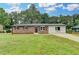 Charming brick home with well-manicured lawn and updated landscaping at 3799 Sweetbriar Cir, Lithia Springs, GA 30122