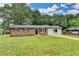 Charming brick home with well-manicured lawn and updated landscaping at 3799 Sweetbriar Cir, Lithia Springs, GA 30122