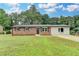 Charming brick home with well-manicured lawn and updated landscaping at 3799 Sweetbriar Cir, Lithia Springs, GA 30122