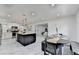 A kitchen features an island, marble tile floors, and stainless steel appliances at 3799 Sweetbriar Cir, Lithia Springs, GA 30122