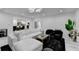 Modern living room with marble floors, an open floor plan, and stylish accent furniture at 3799 Sweetbriar Cir, Lithia Springs, GA 30122