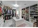 Expansive walk-in closet with custom storage, shelving, and dressing area at 3799 Sweetbriar Cir, Lithia Springs, GA 30122