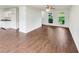 Bright, empty living room with hardwood floors, and lots of natural light at 4311 Marci St, Snellville, GA 30039