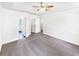 Spacious main bedroom with carpet, ceiling fan, and ensuite bathroom access at 4311 Marci St, Snellville, GA 30039